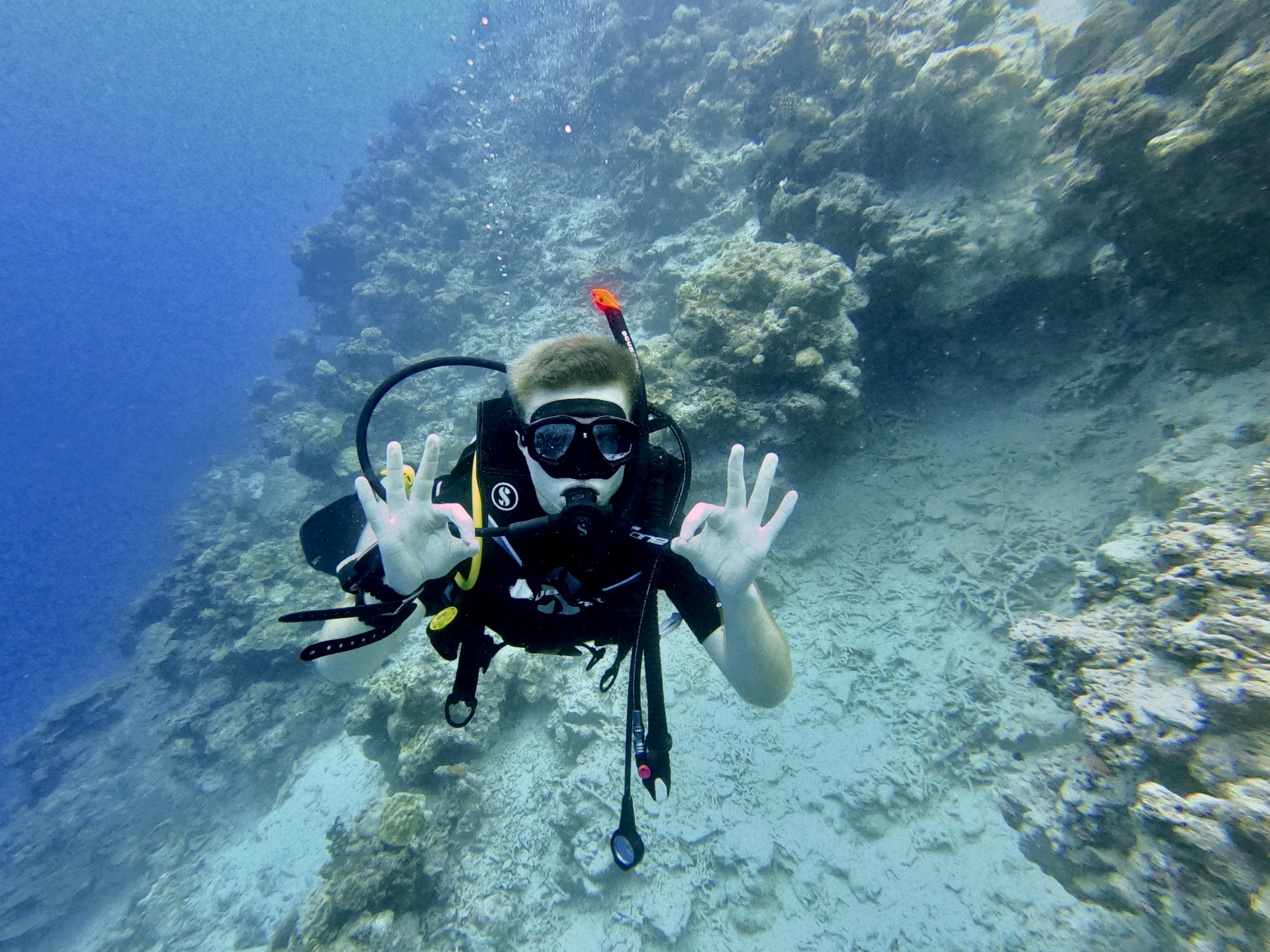 Sam underwater during one of his first open water dives in the Maldives.