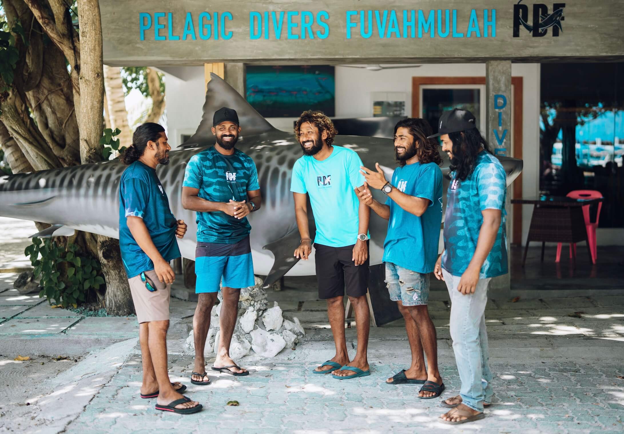 Pelagic Divers Fuvahmulah dive centre team outside the centre.